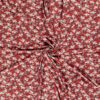 Jersey fabric printed with flowers old pink