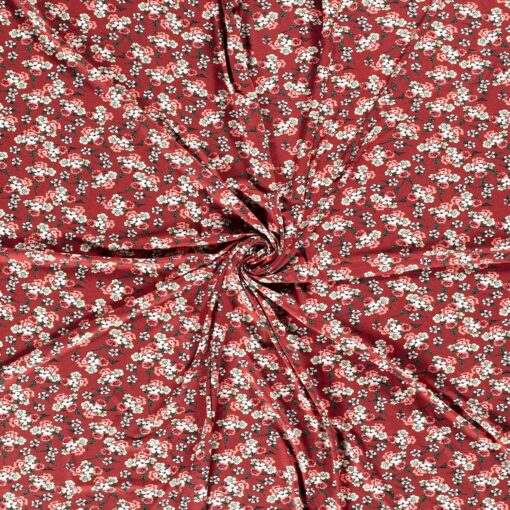 Jersey fabric printed with flowers old pink